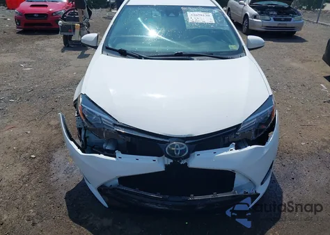 2018 Toyota Corolla Le from USA, damaged, VIN 2T1BURHE9JC969160